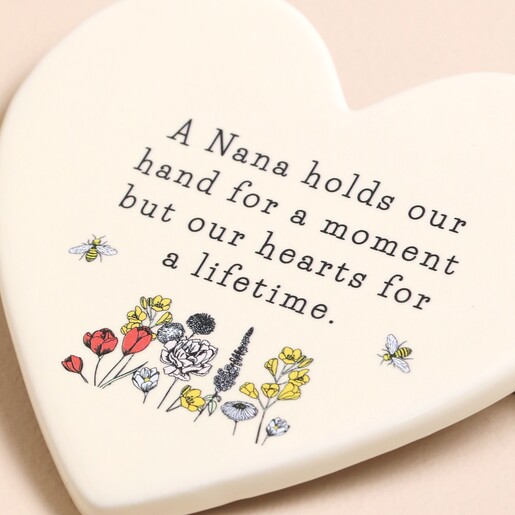 Close Up Grandmother Cream Ceramic Heart Coaster with Nana Option on Beige Background