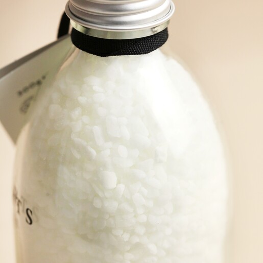 Close up of bath salts inside of Fikkerts For Life Lavender and Geranium Bath Salts bottle