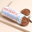 Open Packet of The Chocolate Gift Company Dad Hearts on Beige Backgrounf