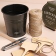Gentlemen's Hardware Gardener's Starter Kit open with items outside of pot