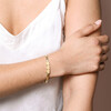 Gold Stainless Steel Three Heart Charm Herringbone Bracelet on Model