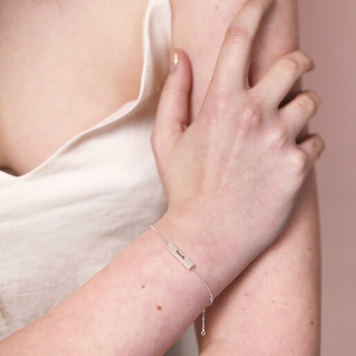 Bracelet on Model Personalised Hexagonal Barrel Charm Bracelet in silver on modem with hand on arm