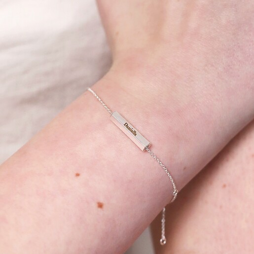 Close Up on Model Close up of Personalised Hexagonal Barrel Charm Bracelet in silver on model