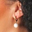 Close Up Model Shot of Gold Stainless Steel Large Pearl Drop Huggie Hoop Earrings 