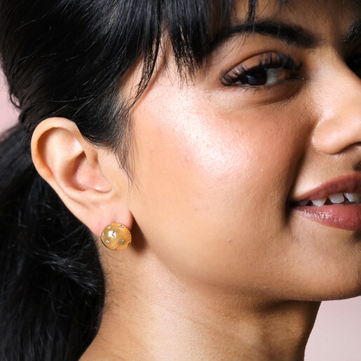 Scattered Crystal Star Wide Half Hoop Earrings in Gold on Model