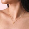 Close up of Croissant Pendant Necklace in Gold on Model