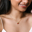 Model Wearing Radish Pendant Necklace in Gold