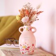 Ceramic Lovely Nana Floral Vase, H15.5cm in lifestyle shot on top of wooden counter against beige backdrop