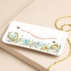 Blooming Lovely Rectangular Floral Trinket Dish with jewellery inside against beige background