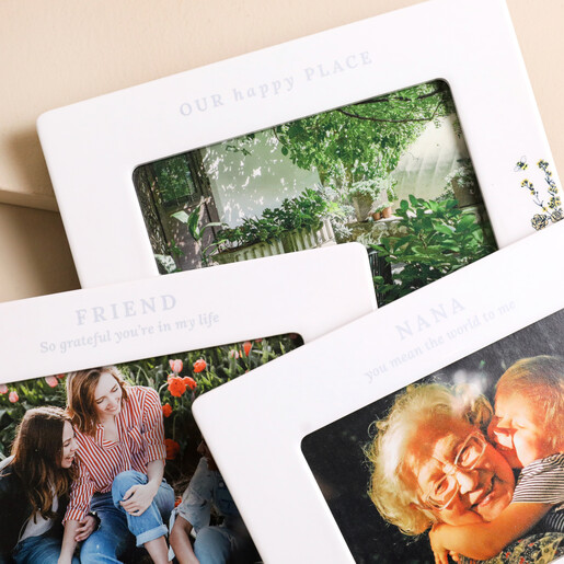 Personalised Wildflower Ceramic Photo Frames Personalised Wildflower Ceramic Photo Frames stacked on top of each other against beige backdrop