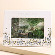 Personalised Wildflower Ceramic Photo Frame with photo of garden inside against beige backdrop