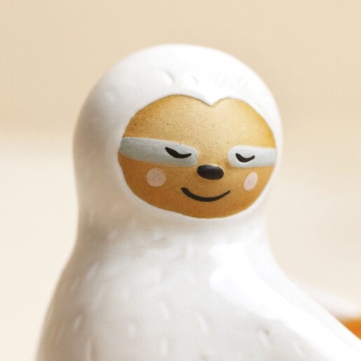 Close Up of Face on Ceramic Sloth Hug Egg Cup
