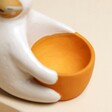 Close Up of Orange bowl of Ceramic Sloth Hug Egg Cup