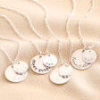 Personalised Sterling Silver Double Disc Charm Necklaces against beige coloured fabric