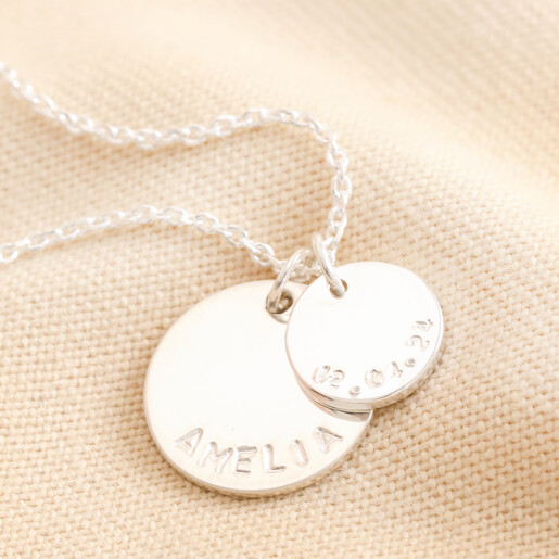 Clean Hand-Stamping Personalised Sterling Silver Double Disc Charm Necklace with clean hand-stamping against neutral backdrop