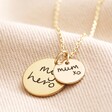 Personalised 'Your Drawing' Double Disc Charm Necklace with large gold charm and small disc charm against beige fabric