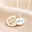 Personalised 'Your Drawing' Double Disc Charm Necklace with large gold disc charm and small silver disc charm against neutral coloured material