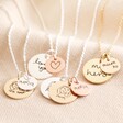 Close up of four different combinations of Personalised 'Your Drawing' Double Disc Charm Necklace against beige coloured backdrop