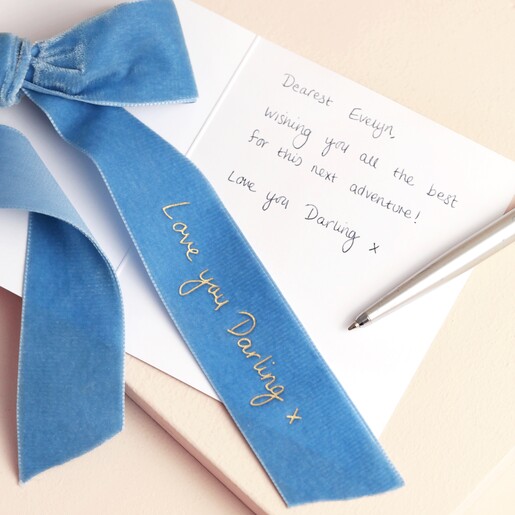 Personalised Handwriting Velvet Wedding Bow Decoration Personalised Handwriting Velvet Wedding Bow Decoration on top of open book