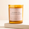 Smoked Fig, Honey and Amber Jar Candle on a Beige Background