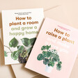 How to Raise a Plant and Make it Love You Back Book with other book against neutral backdrop