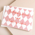 Heather Evelyn Birthday Kisses Birthday Card laying on top of envelope