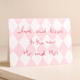Heather Evelyn Mr and Mrs Wedding Card on Pink Surface