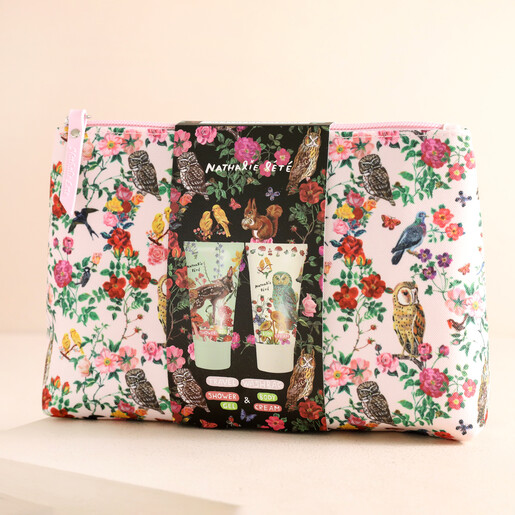 Heathcote & Ivory Nathalie Lété Forest Folk Travel Wash Bag against beige coloured backdrop