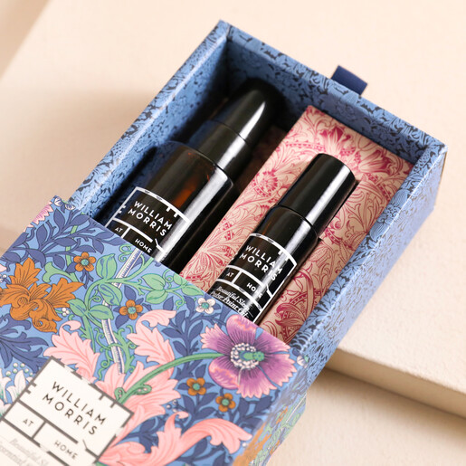 Heathcote & Ivory William Morris at Home Essential Sleep Duo open with products inside of packaging against beige backdrop