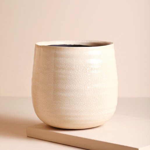 Ivyline Small Ivory Planter on a beige background