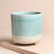 Ivyline Jolie Aqua Matte Reactive Standing Planter against neutral coloured backdrop