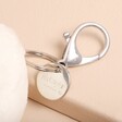 Close up of claw clasp on Jellycat Amuseable Happy Boiled Egg Bag Charm