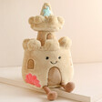 Jellycat Amuseable Sandcastle Soft Toy on top of beige backdrop