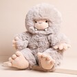 Jellycat Bo Bigfoot Soft Toy on Beige Surface