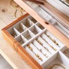 Close Up of Large Glass Top Wooden Jewellery Box with Lid Open