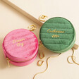Personalised Quilted Velvet Mini Round Travel Jewellery Cases in green and pink against beige background