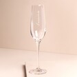 Personalised Name Champagne Glass against beige backdrop
