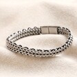 Full Chain of Personalised Men's Stainless Steel Black Cord Woven Chain Bracelet on Beige Fabric