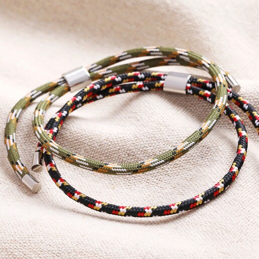 Men's Pull Cord Rope Bracelet in Khaki with black version on top of beige coloured fabric