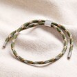 Men's Pull Cord Rope Bracelet in Khaki on top of beige coloured fabric