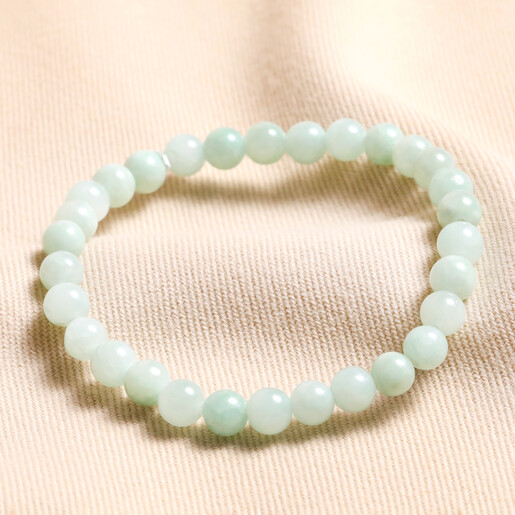 August Birthstone Semi-Precious Stone Beaded Bracelet against neutral backdrop