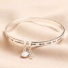 Beach Lover Meaningful Word Bangle in Silver on top of beige coloured fabric
