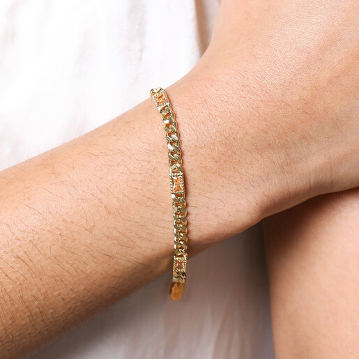 Close Up of Model Wearing Champagne Baguette Crystal Chain Bracelet in Gold 