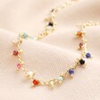 Colourful Semi-Precious Stone Tiny Droplet Necklace in Gold on Beige Background