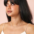 Dainty Flower Charm Necklace in Silver on model