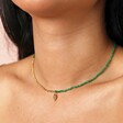 Close up on model of the Green Stone Beaded Shell Pendant Necklace in Gold