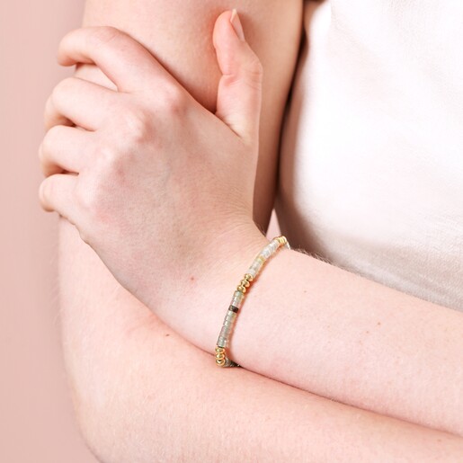 Green Semi-Precious Stone Heishi Beaded Bracelet in Gold on model with hand on arm