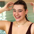 Mixed Rondelle Stone Beaded Necklace in Gold on Model in Pool