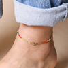 Close up of Multicoloured Miyuki Bead Cord Anklet in Gold on model against beige backdrop