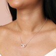 close up of the Personalised Interlocking Hearts Necklace on Model in Silver 